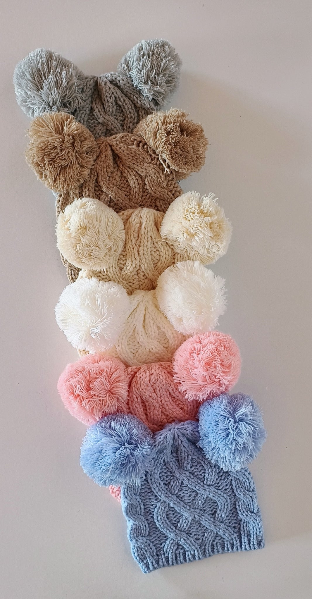 Cuffietta pon-pon 0-3 mesi